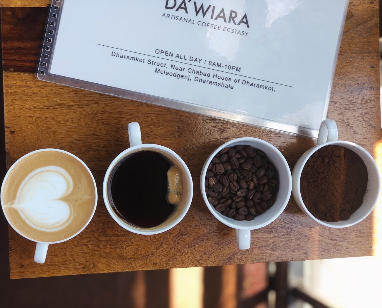 Da'Wiara menu with four coffee cups