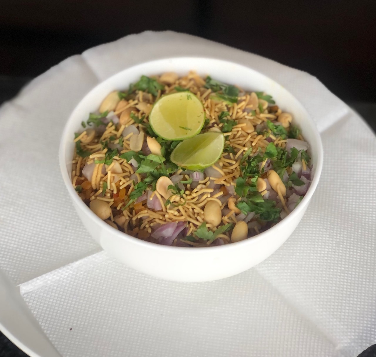 Poha with peanuts and fresh lime